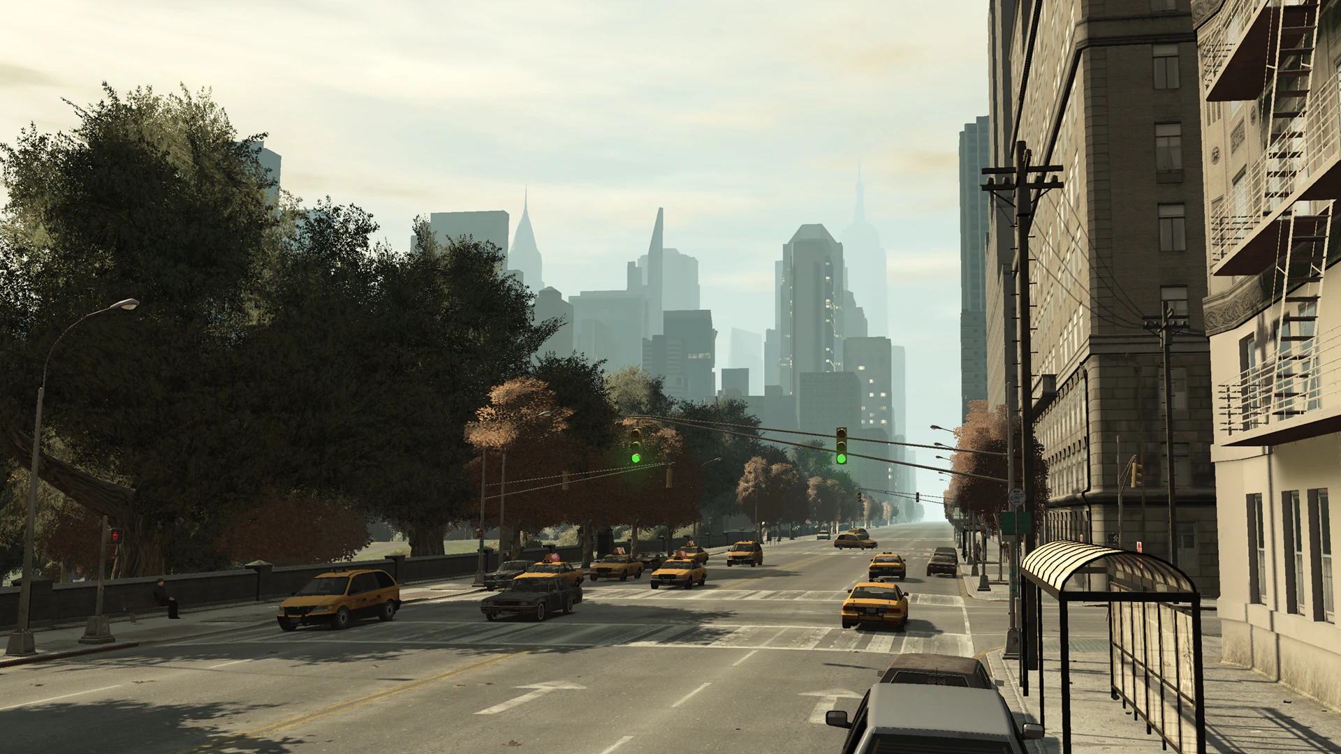 Yellow taxis moving through morning traffic on Frankfort Avenue