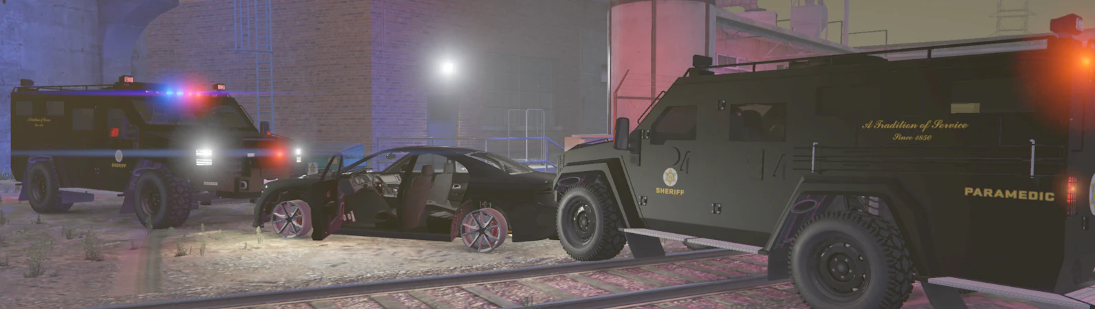 Armored sheriff's vehicles surround a damaged black car in an official image accompanying the pursuit release